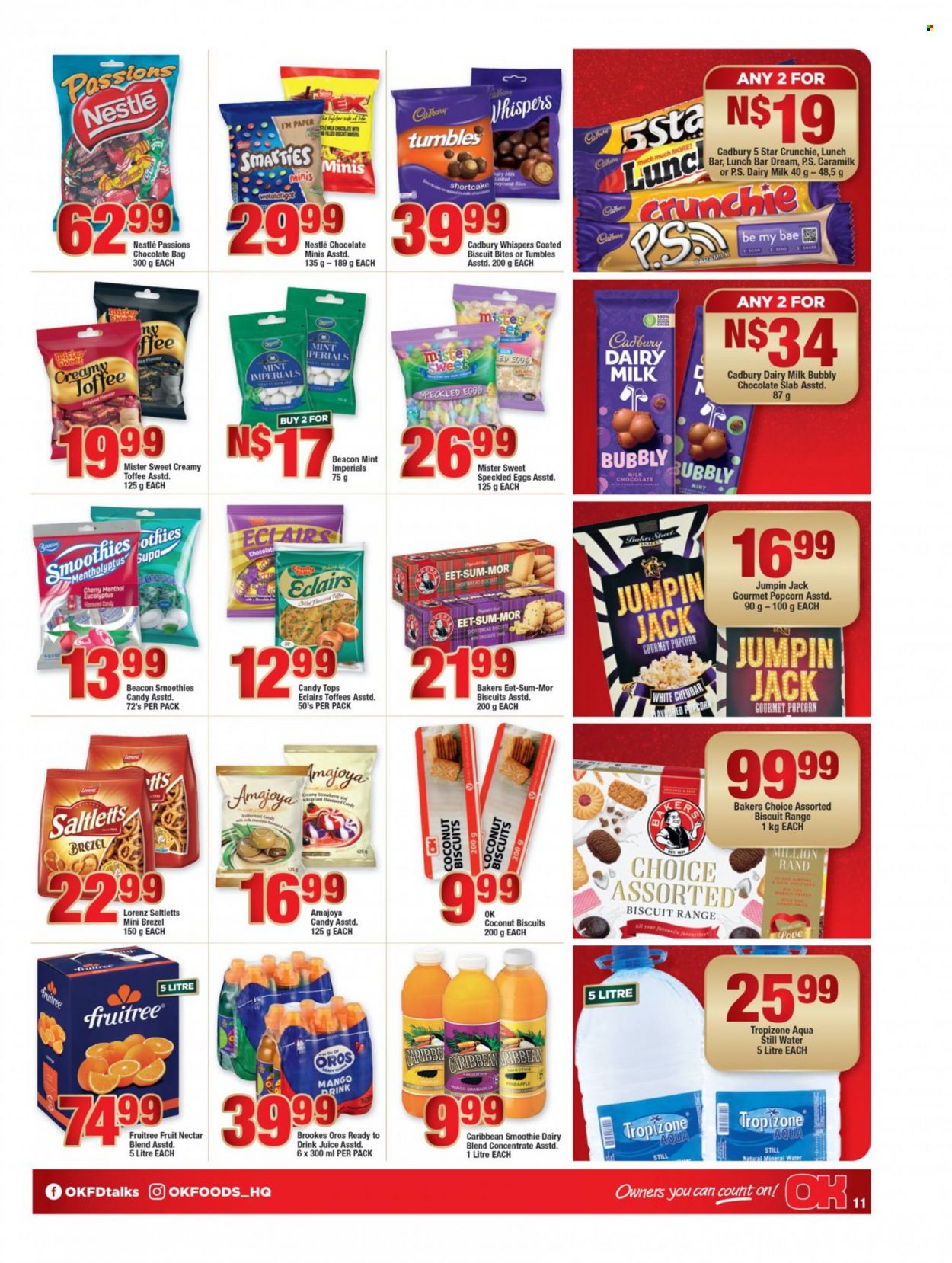OK catalogue  - 21/11/2022 - 11/12/2022 - Sales products - pineapple, cherries, cheddar, cheese, dairy blend, eggs, milk chocolate, Nestlé, wafers, chocolate, snack, Toffees, toffee, tumbles, Smarties, biscuit, Cadbury, Dairy Milk, popcorn, rice, juice, fruit nectar, Oros, smoothie, mineral water, bottled water. Page 10.